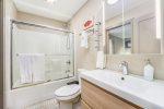 Full bathroom with a shower tub combo